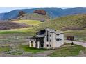 Exceptional hillside home with a walkout basement, stunning view, and a relaxing deck at 5815 Peppy San Cir, Sedalia, CO 80135