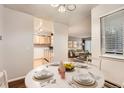 Charming dining area with kitchen views and a bright, open feel at 14590 E 2Nd Ave # 304B, Aurora, CO 80011