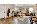 Cozy living room with hardwood floors, natural light, comfortable seating and stylish decor at 4509 Eliot St, Denver, CO 80211