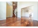 Spacious living room with hardwood floors and staircase at 18112 E Dorado Ave, Centennial, CO 80015