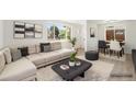 Comfortable living room featuring modern decor and a neutral color palette at 3581 Olive St, Denver, CO 80207