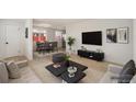 Bright living room with stylish furniture and lots of natural light at 3581 Olive St, Denver, CO 80207