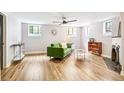 Bright living room with hardwood floors, ample natural light, and a cozy atmosphere at 485 S Logan St # 10, Denver, CO 80209
