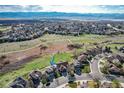 Expansive aerial view of the neighborhood highlighting proximity to parks and open spaces at 10233 Silver Maple Cir, Highlands Ranch, CO 80129