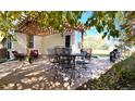 Cozy patio with seating area under a pergola at 16355 Flintlock Ct, Parker, CO 80134