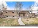 Charming two-story home with well-maintained landscaping and inviting curb appeal at 1095 Lake Woodmoor Dr, Monument, CO 80132