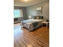 Comfortable bedroom with ample natural light and neutral décor offers a peaceful retreat at 13626 E Bates Ave # 110, Aurora, CO 80014