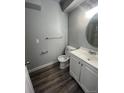 Clean bathroom with a white vanity, toilet, and shower/tub combo at 2678 S Xanadu Way # C, Aurora, CO 80014