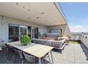 Relax on this condo's fantastic patio with lots of comfortable outdoor furniture at 1711 Boulder St, Denver, CO 80211