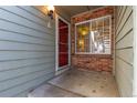 Exterior entryway with brick and siding at 4084 S Carson St # A, Aurora, CO 80014