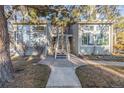 Two-story townhome with stairs and landscaping at 4084 S Carson St # A, Aurora, CO 80014