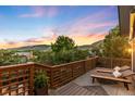 Outdoor patio area with lounge seating and mountain view at 600 Cascade Dr, Golden, CO 80403