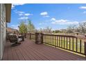 Outdoor patio seating area with view, perfect for relaxing and entertaining at 7750 S Buchanan Way, Aurora, CO 80016