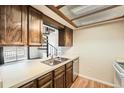 Well-maintained kitchen featuring a bright overhead light fixture with lots of counter space at 10890 W Evans Ave # 3D, Lakewood, CO 80227