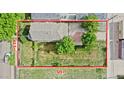 Aerial view of property with large grassy backyard, measuring 62.5 ft x 125 ft at 2809 Yates St, Denver, CO 80212