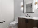 Modern bathroom featuring a sleek vanity, minimalist lighting, and clean, contemporary design at 4225 N Navajo St, Denver, CO 80211