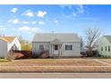 Charming single story home with a well maintained lawn at 3230 S Bannock St, Englewood, CO 80110