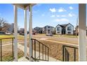 View of the street from the front porch of the house at 3230 S Bannock St, Englewood, CO 80110