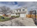 Delightful townhouse with a single car garage and a well manicured lawn at 11821 W Independence Ave, Lakewood, CO 80401