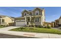Beautifully maintained home with a two-car garage, charming porch, and landscaped front yard at 16308 Saint Paul St, Thornton, CO 80602