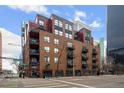 Brick apartment building in downtown with balconies and street-level retail at 1800 Lawrence St # 408, Denver, CO 80202