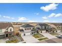 Panoramic aerial view of a residential area showcasing homes and the landscape of the surrounding community at 17311 Rose Mallow St, Parker, CO 80134