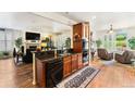 Kitchen featuring stainless appliances, granite counters and an open concept design at 19780 W 57Th Ln, Golden, CO 80403