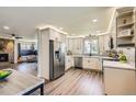 Modern kitchen features stainless steel appliances, and bright countertops at 21 Douglas N Dr, Broomfield, CO 80020