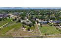 An aerial view of the property showcasing the spacious lot, landscaping, and neighborhood at 14652 Kalamath Ct, Westminster, CO 80023