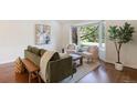 Inviting living room with a bay window and comfortable seating at 6213 S Galena Way, Englewood, CO 80111