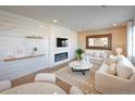 Bright living room with fireplace, modern decor, cozy seating, and stylish accents create a relaxing ambiance at 23751 E 40Th Ave, Aurora, CO 80019