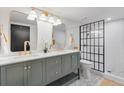 Beautiful bathroom with dual sinks, modern shower, and stylish fixtures at 2649 N High St, Denver, CO 80205