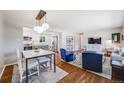 Spacious living area flows seamlessly into the kitchen, perfect for entertaining and everyday living at 6924 S Albion St, Centennial, CO 80122