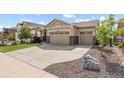 Lovely home boasting a spacious driveway and well-kept landscaping at 17956 Gypsum Canyon Ct, Monument, CO 80132