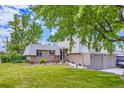 Charming exterior view of a home with a lush lawn and a well-maintained landscape at 3378 Mowry Pl, Westminster, CO 80031