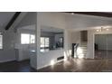 Renovated kitchen features white cabinets and quartz countertops at 6769 W Fair Dr, Littleton, CO 80123