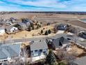 Suburban neighborhood aerial view showcasing home in proximity to open spaces and walking paths at 14669 Eagle River Run, Broomfield, CO 80023