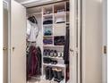 Organized walk-in closet with clothing, shoes, and shelves at 1513 48Th St # 7, Boulder, CO 80303