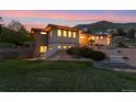 Expansive home featuring meticulous landscaping, offering both beauty and privacy at 4305 Easley Rd, Golden, CO 80403