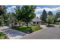 Well-maintained home with beautiful landscaping and a spacious front yard at 17 E Belleview Ln, Greenwood Village, CO 80121