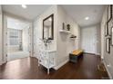 Welcoming foyer with hardwood floors, stylish decor, and an inviting ambiance at 398 Midden Pl, Castle Rock, CO 80104