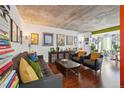 Spacious living area with hardwood floors and eclectic decor at 2 Adams St # 1010, Denver, CO 80206