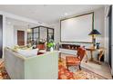 Comfortable living room featuring modern fireplace at 155 Steele St # 418, Denver, CO 80206