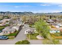 Sprawling neighborhood with mountain views, lush greenery, and charming single-Gathering homes at 1055 Quartz St, Golden, CO 80401