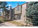 Relaxing backyard featuring a patio and sliding door leading to this delightful home at 3407 S Ammons St # 20-1, Lakewood, CO 80227