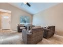 Cozy sitting room with plush chairs and a large window for natural light at 5191 S Nepal Way, Centennial, CO 80015