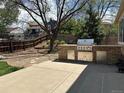 Outdoor kitchen with a stainless steel grill, set on a concrete patio, perfect for entertaining in the fenced yard at 3298 W 11Th Avenue Pl, Broomfield, CO 80020