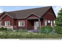 A well-manicured lawn surrounds this two-story home, featuring a welcoming covered porch at 900 W 128Th Pl, Westminster, CO 80234
