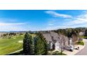 A lovely view showcases the exterior of this home with a three car garage and well-manicured lawns at 3383 Mount Royal Dr # 46, Castle Rock, CO 80104