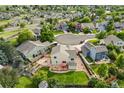 Aerial view of a residential neighborhood featuring mature trees and well-maintained lawns at 11100 Callaway Ct, Parker, CO 80138